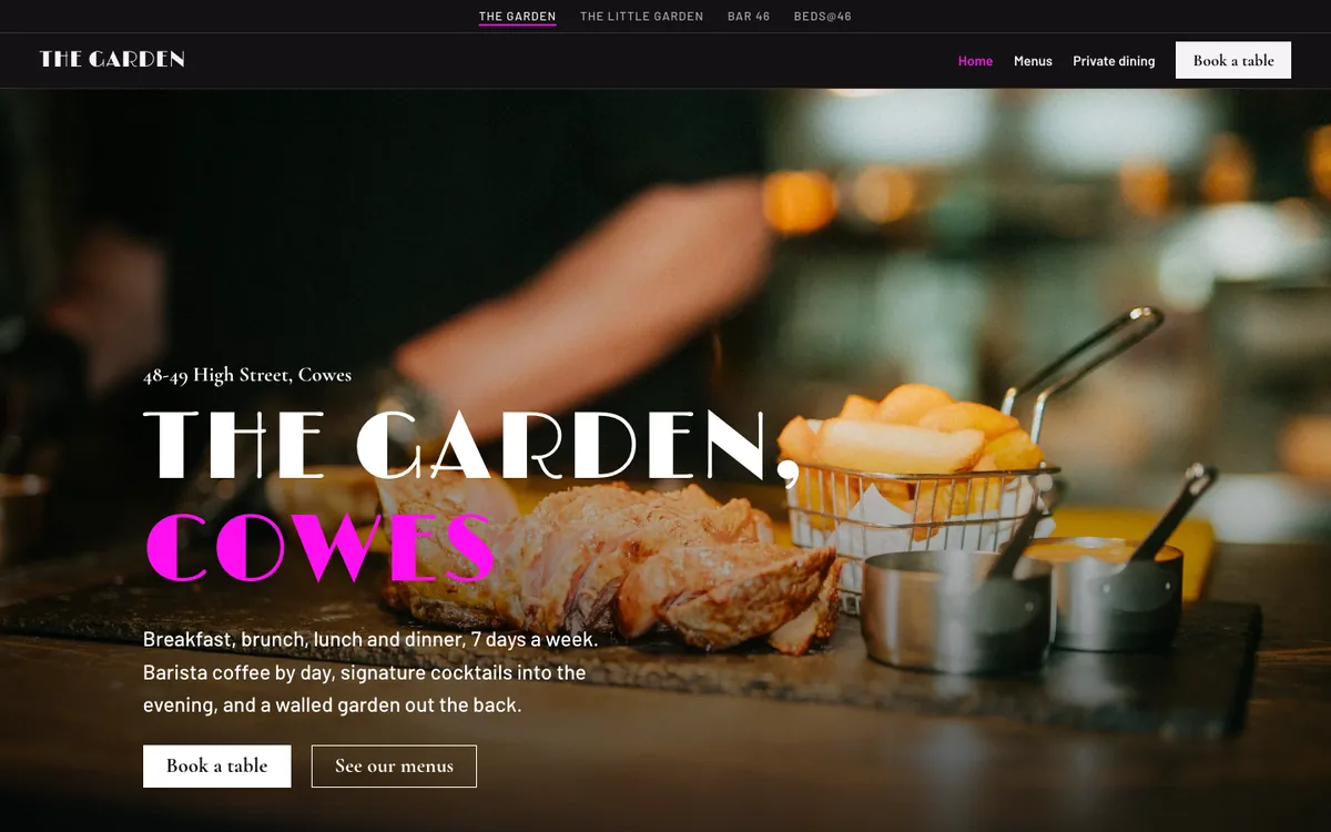 The Garden homepage: The Garden, Cowes in tall white and pink letters over a plate of steak and chips.